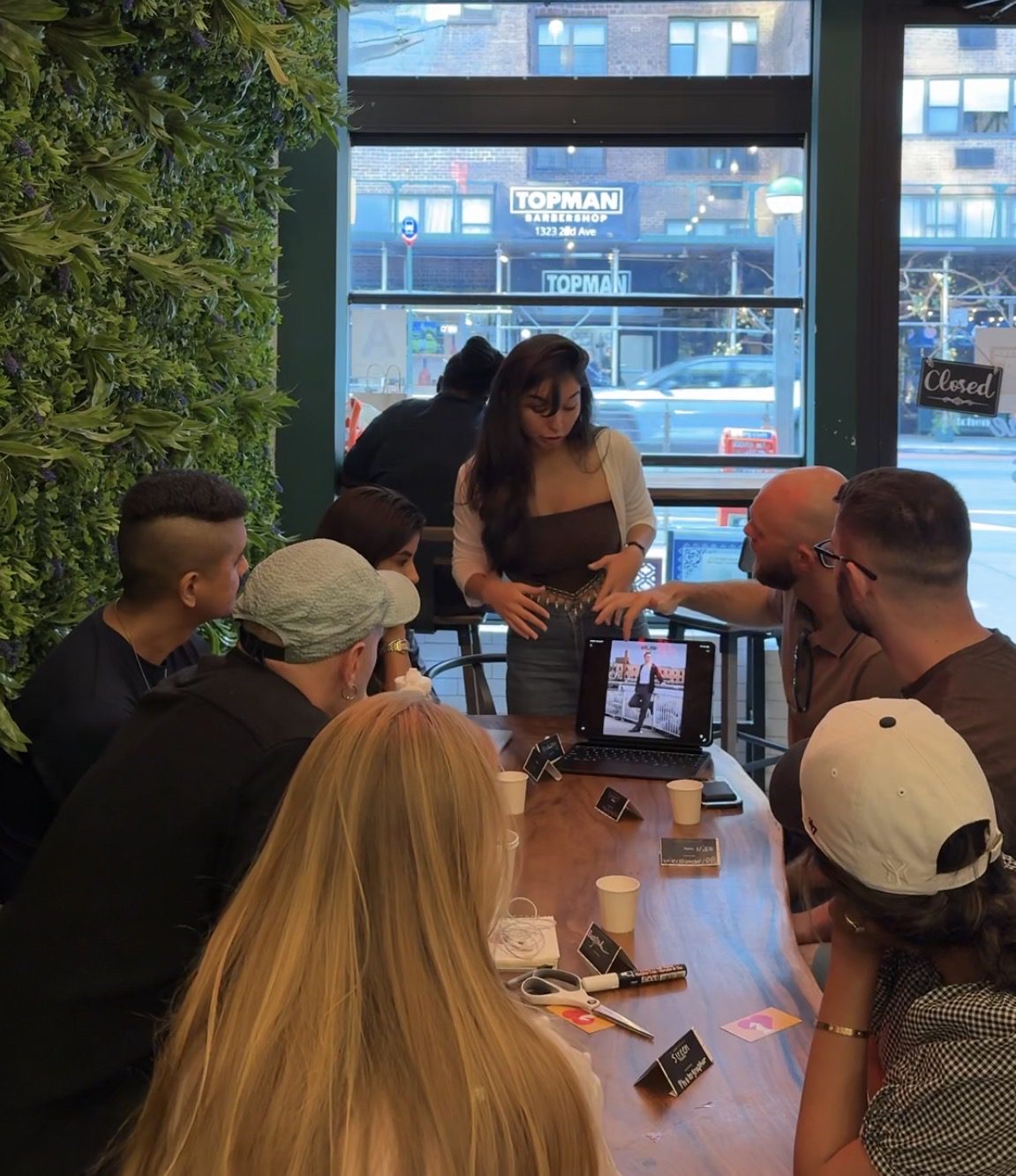 Creative team planning social media content and video production for a New York City business